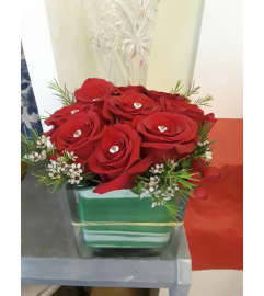 Good to be Square Red Roses. An arrangement by Awe Flowers.