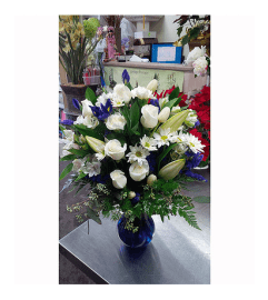 Love is Blue by Vivian. An arrangement by Vivian Flowers.