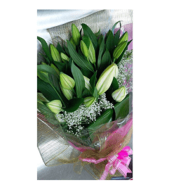 Hand tied bouquet of 10 stems white Lilies by Vivian. An arrangement by Vivian Flowers.