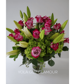 Luxurious Roses and Lilies. An arrangement by Brickell Exclusive Blooms.