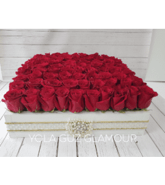 Channel 100 Roses in Wood. An arrangement by Brickell Exclusive Blooms.