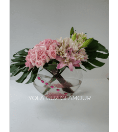 Channel 25 Roses And Lilies. An arrangement by Brickell Exclusive Blooms.