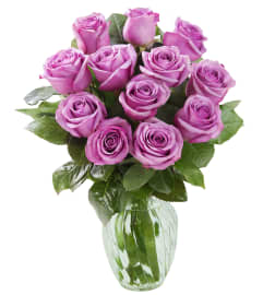 DOZEN PURPLE ROSES ARRANGED. An arrangement by Flowers by Priscilla.