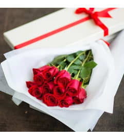 Dozen Red Roses in a box. An arrangement by Select Flowers.