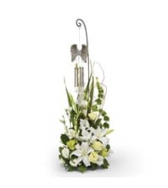 Angel Wings Wind Chime Tribute. An arrangement by Pretty Petals Floral Boutique.