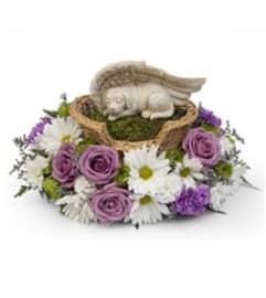 Eternal Best Friend Pet Tribute. An arrangement by Pretty Petals Floral Boutique.
