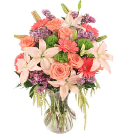 FSN-TOUCH HER HEART. An arrangement by Erika's Flowers.