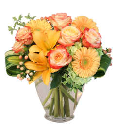FSN-LOVE ME AT SUNSET. An arrangement by Erika's Flowers.