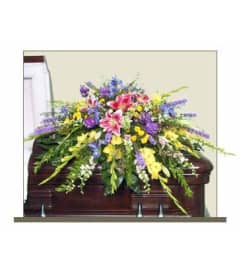 FSN-RESTFUL GARDEN CASKET. An arrangement by Erika's Flowers.