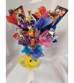 Happy Face Candy Bouquet. An arrangement by Jane's Floral Dreams.