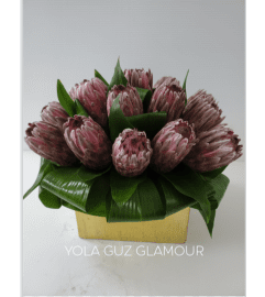 Protea In Gold. An arrangement by Brickell Exclusive Blooms.