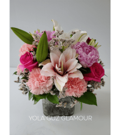 Spring Florals In Cube. An arrangement by Brickell Exclusive Blooms.