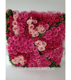 Pink Roses in Wood. An arrangement by Brickell Exclusive Blooms.