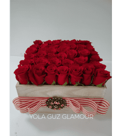 Channel Roses in Wood. An arrangement by Brickell Exclusive Blooms.