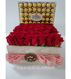Channel Roses and Chocolates. An arrangement by Brickell Exclusive Blooms.