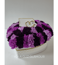 Channel Heart And Carnations. An arrangement by Brickell Exclusive Blooms.