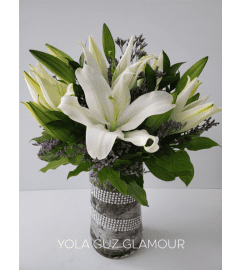 Channel and White Lilies. An arrangement by Brickell Exclusive Blooms.