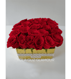 Channel Roses in Gold Ceramic. An arrangement by Brickell Exclusive Blooms.
