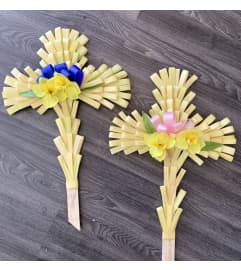 Palm Crosses Set. An arrangement by Violeta's Flower Shop.