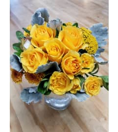 Hugs to You...Sunshine Yellow. An arrangement by Twigs Flower Company.