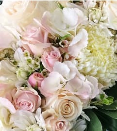 Pastel Flower Urn. An arrangement by Deep Creek Floral.