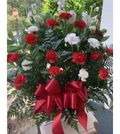 Sending love in Red and White Sympathy Basket. An arrangement by Seasons Change Designs.