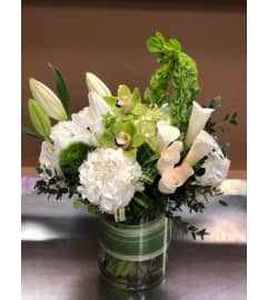 Elegant Blessings. An arrangement by Hillcrest Florist.