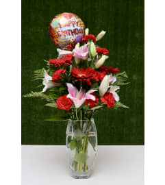 Birthday Delight Floral Design in a Premium Polish Vase. An arrangement by Shalimar Flower Shop.