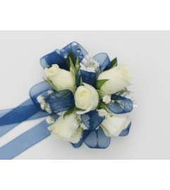 White and blue corsage. An arrangement by Northwest Florist.