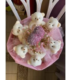 Pink Teddy Bear Round Bouquet. An arrangement by Flamingo Floral and Gifts.