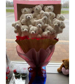 Long Presentation Teddy Bear Bouquet 2. An arrangement by Flamingo Floral and Gifts.