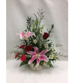 In The Garden Basket. An arrangement by Balloon Bouquets Plus. In The Garden Basket. An arrangement by Balloon Bouquets Plus.
