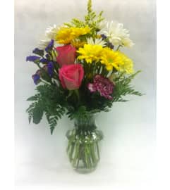 Happy Moments Vase Arrangement. An arrangement by Balloon Bouquets Plus.