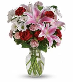 Love's Rush Vase Arrangement. An arrangement by Balloon Bouquets Plus. Love's Rush Vase Arrangement. An arrangement by Balloon Bouquets Plus.