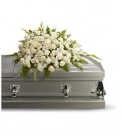 White Memories Casket Spray. An arrangement by Northwest Florist.
