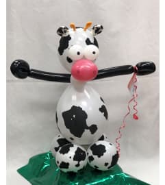 Cow Balloon Buddy. An arrangement by Balloon Bouquets Plus.
