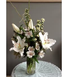 Simply white lilies. An arrangement by Flowers in Bloom.