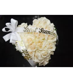 Devoted Heart Casket Insert. An arrangement by Creations de Belle.