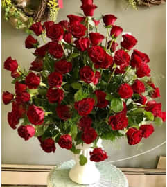 Grand red rose bouquet. An arrangement by Flowers in Bloom.