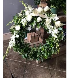 Natural beauty wreath. An arrangement by Flowers in Bloom.