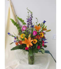 Spanish Dancer. An arrangement by Always in Bloom Flower Shop.