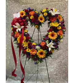 Fall Love Heart Spray. An arrangement by Flowers by Neil. Fall Love Heart Spray. An arrangement by Flowers by Neil.