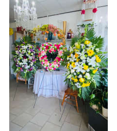 Graceful Tribute Trio. An arrangement by Sonia's Florist.