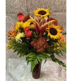 Autumn Fields Vase. An arrangement by Flowers by Neil.