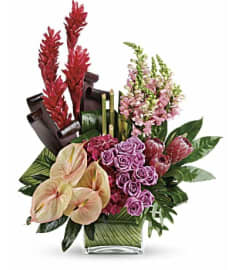 A Tropical Extravaganza. An arrangement by Aventura Glamour Flowers. A Tropical Extravaganza. An arrangement by Aventura Glamour Flowers.
