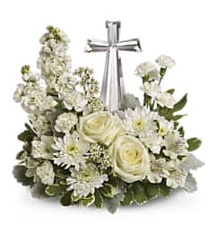 Divine Peace Cross. An arrangement by Love Story Florist.