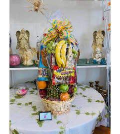 Bountiful Fruit and Gourmet Basket. An arrangement by Sonia's Florist.