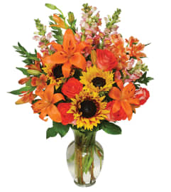 FALL FLOWER GALA ARRANGEMENT. An arrangement by Elegant Florist.