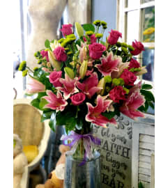 Gazers and Roses. An arrangement by Santa Fe Florals and Events.