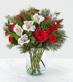 The FTD Holiday Cheer Arrangement. An arrangement by Balloon Bouquets Plus.